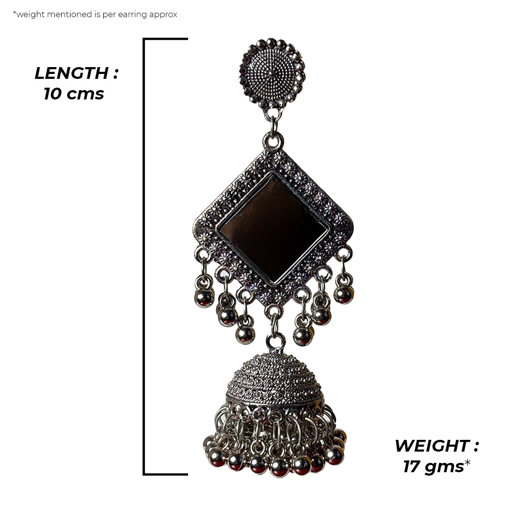 Meghana Earrings: Close-up of delicate gold hoop earrings with a pearl drop, showcasing intricate craftsmanship.