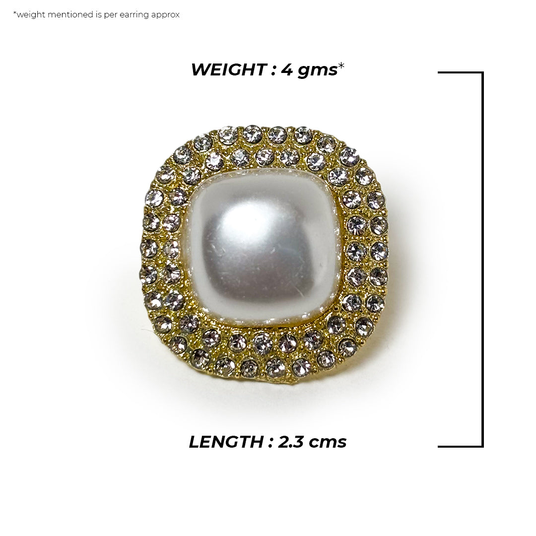 Close-up of the Alina Pearl Earring, showcasing its delicate pearl and gold setting.