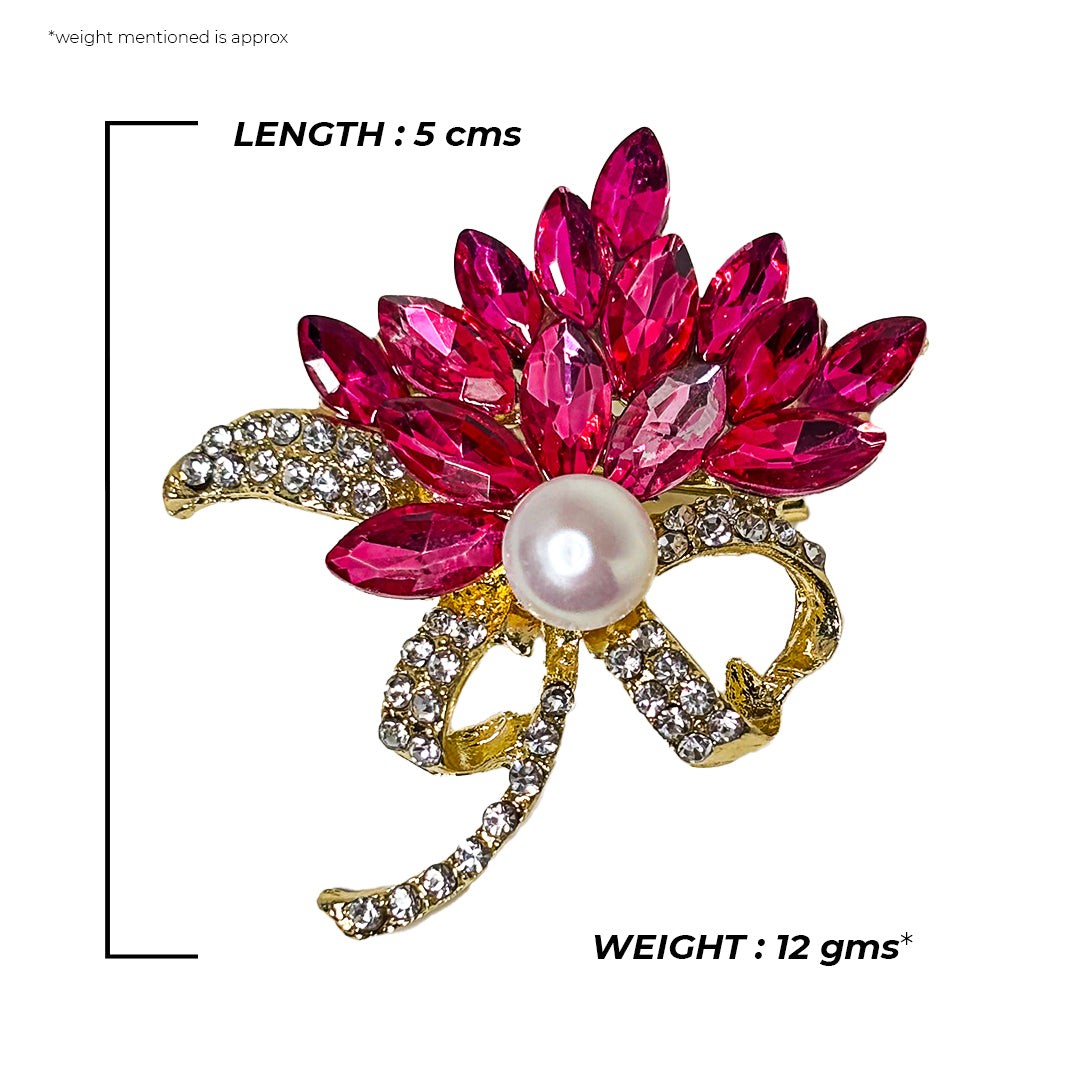 Close-up of the Ava Saree Pin, a gold-toned metal brooch with intricate floral detailing, designed to secure a saree.