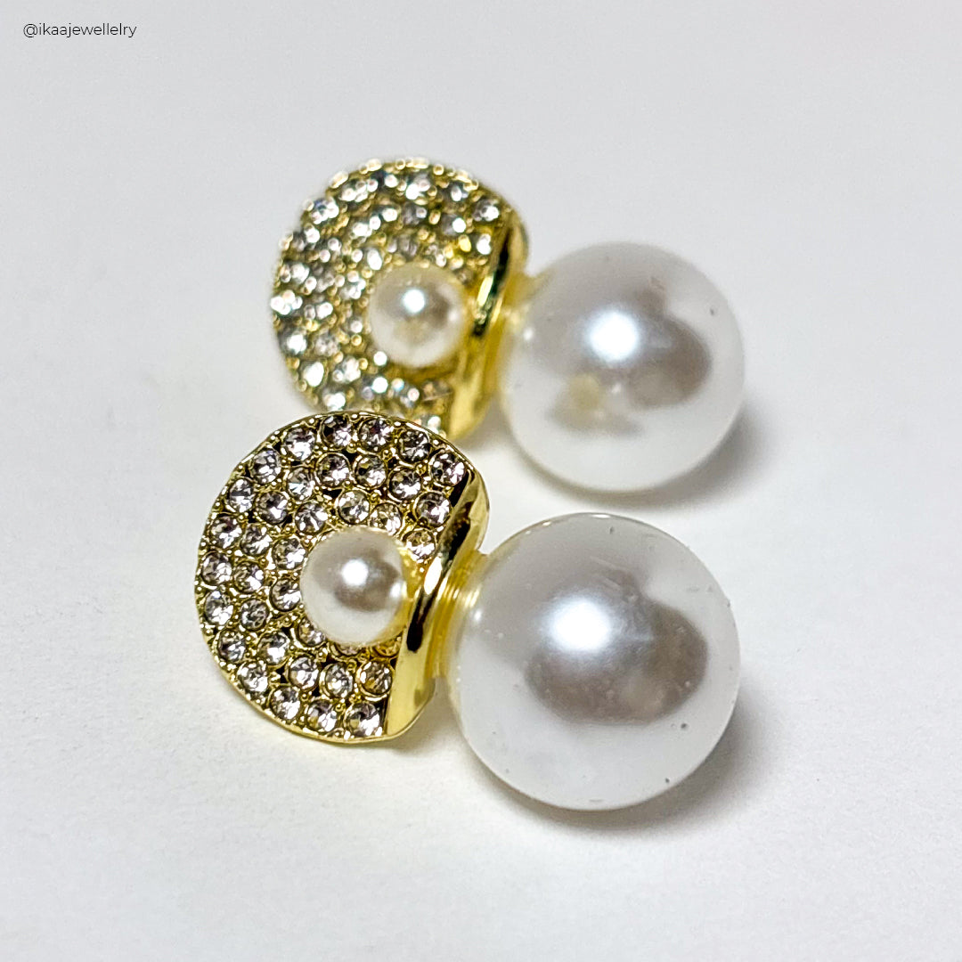 Elegant Saisha Pearl Earring featuring a single, lustrous pearl set in polished gold.
