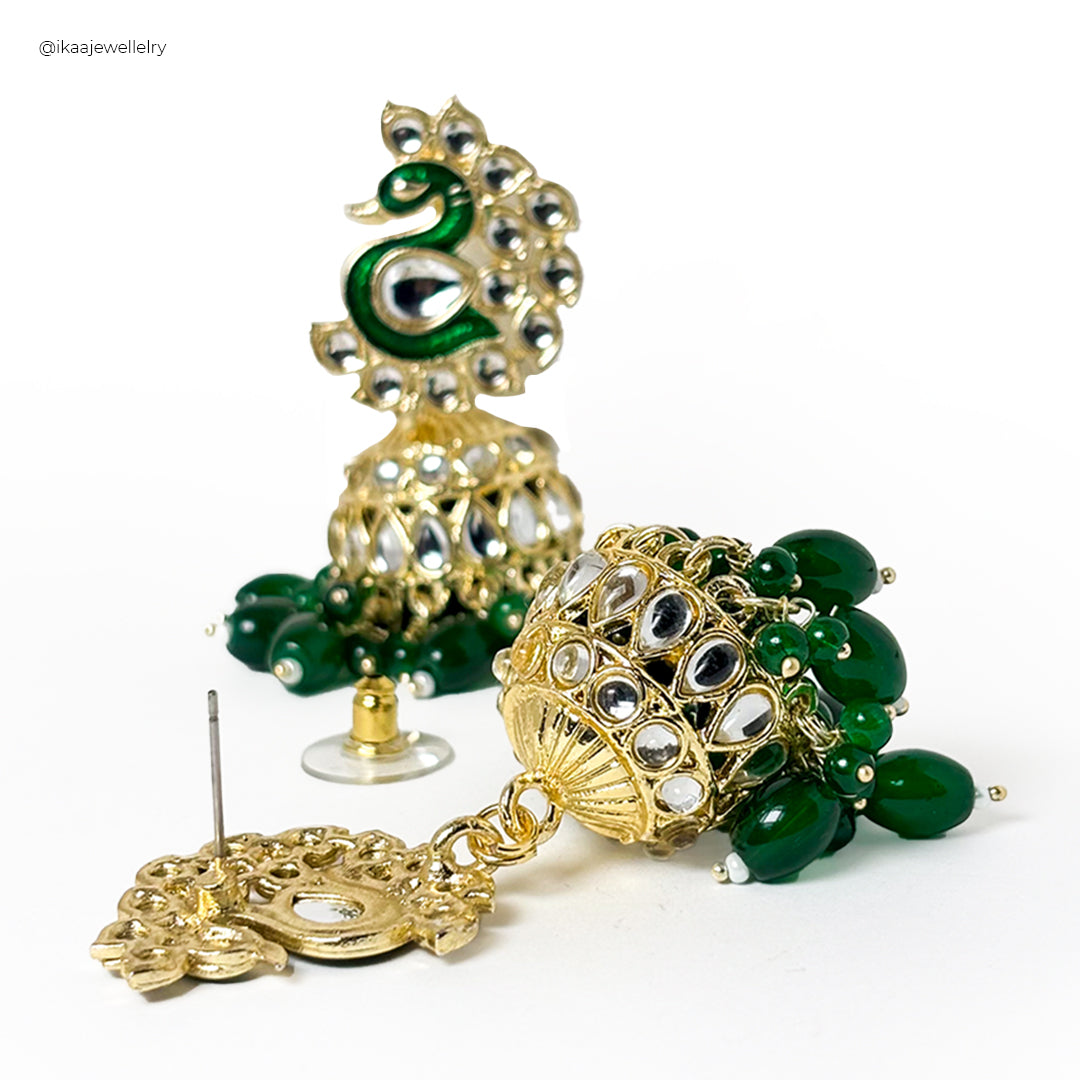 Morini Jhumki Earrings: Close-up of ornate gold jhumki earrings with intricate detailing.