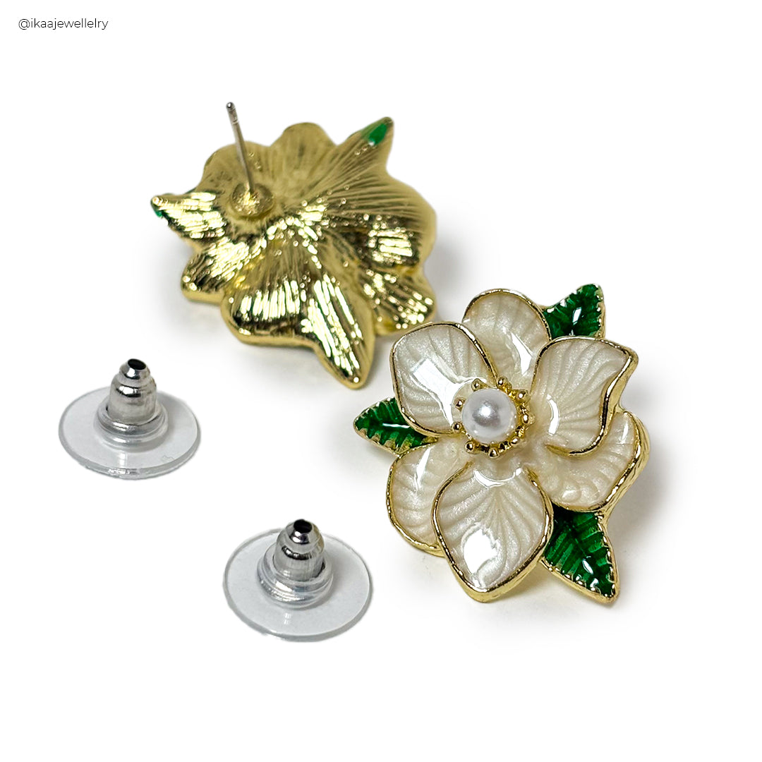 Roselle Ceramic Look Earrings, a pair of elegant, translucent pink drop earrings with a floral design.