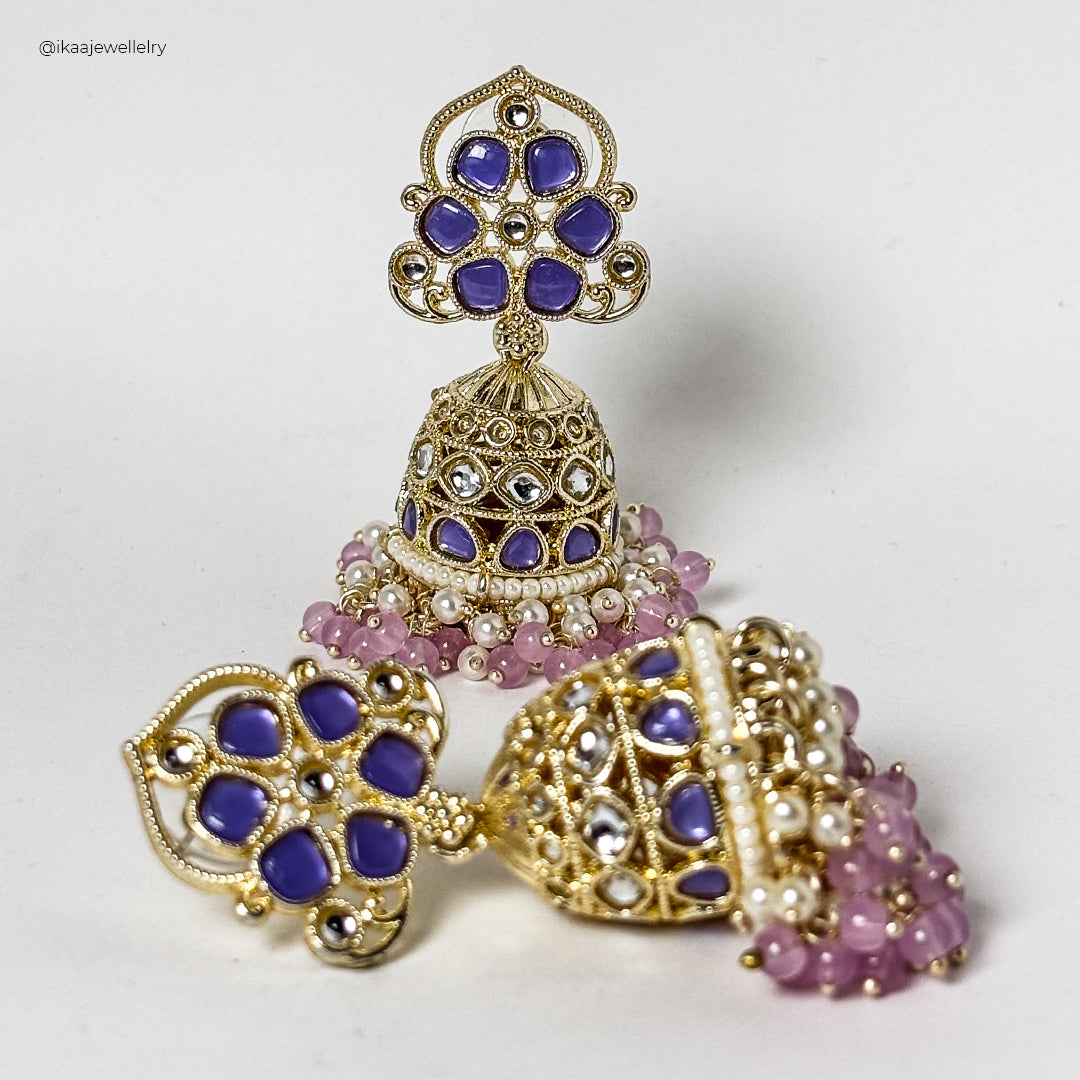 Pallavi Jhumka Earrings: Intricately crafted gold-toned jhumkas with pearl accents and delicate dangling chains.