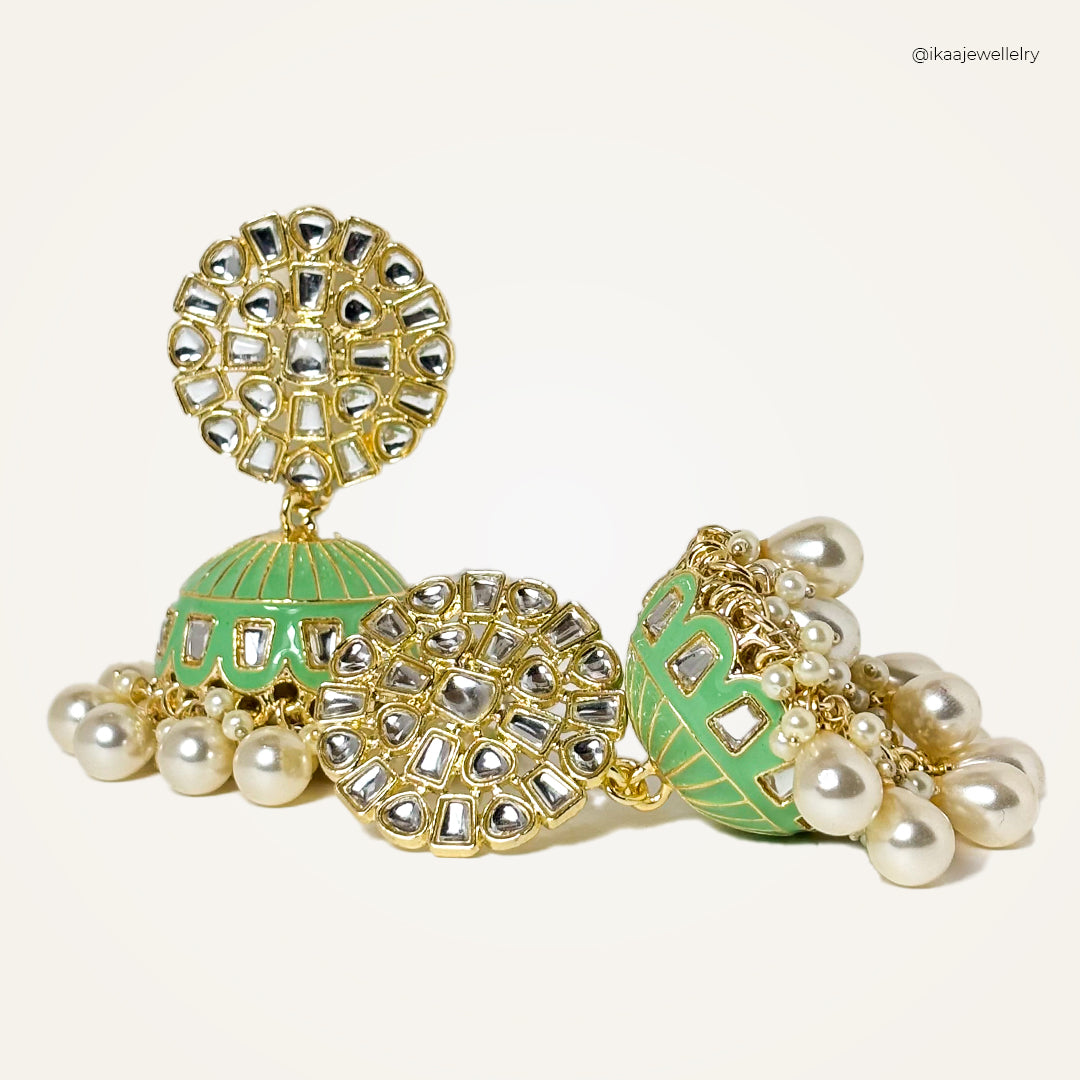 Gold Aaria Jhumki Earrings with intricate floral and bead detailing, showcasing traditional Indian craftsmanship.